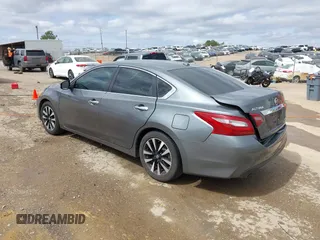 2018 Nissan Altima S with VIN 1N4AL3APXJC122072, listed as a IAAI auction lot 41749875 with 184,127 mi miles and . Bid and sale history available at DreamBid. Image 3.