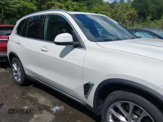 2024 BMW X5 xDrive40i z VIN 5UX23EU05R9S29952, wystawiony jako IAAI lot #42177371 z przebiegiem 26 832 mil mil oraz . Historia ofert i sprzedaży dostępna na DreamBid. Obrazek 13.