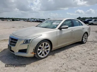 2014 Cadillac CTS Premium RWD z VIN 1G6AT5SXXE0107506, wystawiony jako Copart lot #61143685 z przebiegiem 102 541 mil mil oraz Szkoda całkowita • Salvage title. Historia ofert i sprzedaży dostępna na DreamBid. Obrazek 1.