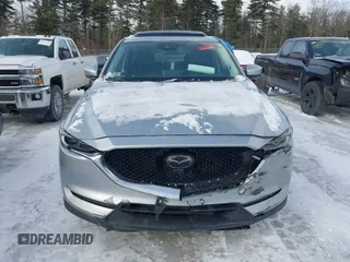 2021 Mazda CX-5 Grand Touring Reserve with VIN JM3KFBAY0M0377030, listed as a IAAI auction lot 41606709 with 39,590 mi miles. Bid and sale history available at carsss.com. Image 12.