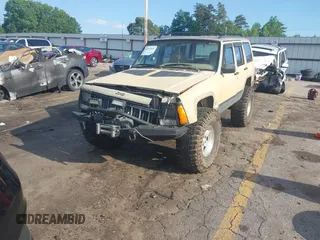 1995 Jeep Cherokee Sport with VIN 1J4FJ68S3SL555908, listed as a IAAI auction lot 42222016 with 283,444 mi miles and . Bid and sale history available at DreamBid. Image 17.
