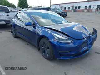 2021 Tesla Model 3 Long Range z VIN 5YJ3E1EB4MF974716, wystawiony jako IAAI lot #42225007 z przebiegiem 40 003 mil mil oraz . Historia ofert i sprzedaży dostępna na DreamBid. Obrazek 1.