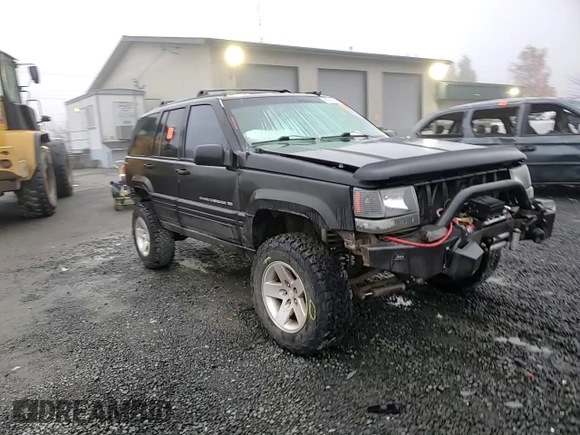 1998 Jeep Grand Cherokee Laredo with VIN 1J4GZ48S0WC171138, listed as a Copart auction lot 85502794 with 0 mi miles and Salvage Title. Bid and sale history available at carsss.com. Image 11.
