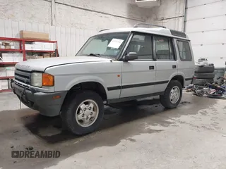 1996 Land Rover Discovery z VIN SALJY1282TA192177, wystawiony jako IAAI lot #42221390 z przebiegiem 167 727 mil mil oraz . Historia ofert i sprzedaży dostępna na DreamBid. Obrazek 2.