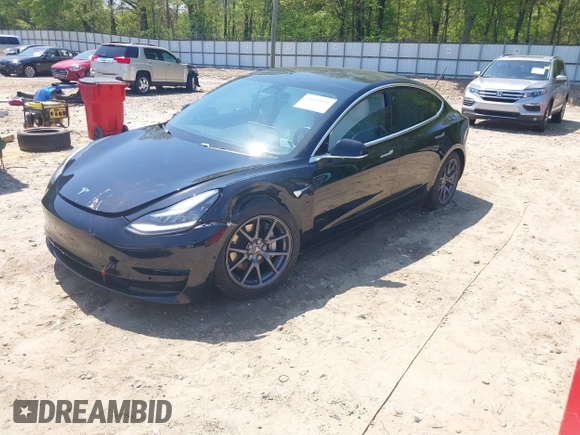 2018 Tesla Model 3 Long Range Battery with VIN 5YJ3E1EB1JF122786, listed as a IAAI auction lot 42010451 with 85,510 mi miles and . Bid and sale history available at DreamBid. Image 19.