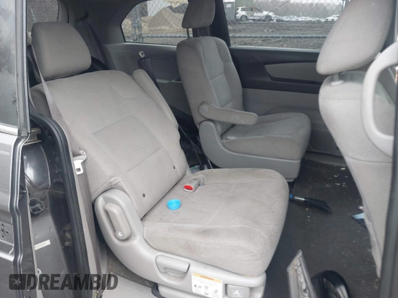 2014 Honda Odyssey LX z VIN 5FNRL5H2XEB009962, wystawiony jako IAAI lot #41902277 z przebiegiem 152 661 mil mil oraz . Historia ofert i sprzedaży dostępna na DreamBid. Obrazek 8.