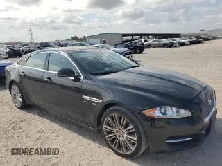 2014 Jaguar XJ with VIN SAJWA2GT0EMV61531, listed as a Copart auction lot 61071054 with 79,266 mi miles and Clean Title. Bid and sale history available at DreamBid. Image 4.