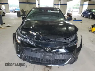 2021 Toyota Corolla Hatchback SE with VIN JTND4MBE9M3135094, listed as a Copart auction lot 71599094 with 51,063 mi miles and Salvage Title. Bid and sale history available at carsss.com. Image 5.
