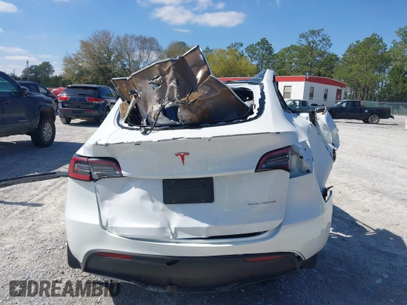 2023 Tesla Model Y Long Range with VIN 7SAYGAEE1PF665934, listed as a IAAI auction lot 41780949 with 21,949 mi miles and . Bid and sale history available at DreamBid. Image 15.