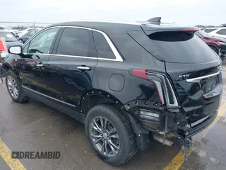 2021 Cadillac XT5 FWD Premium Luxury with VIN 1GYKNCRS3MZ103893, listed as a IAAI auction lot 41286761 with 75,728 mi miles and . Bid and sale history available at carsss.com. Image 3.