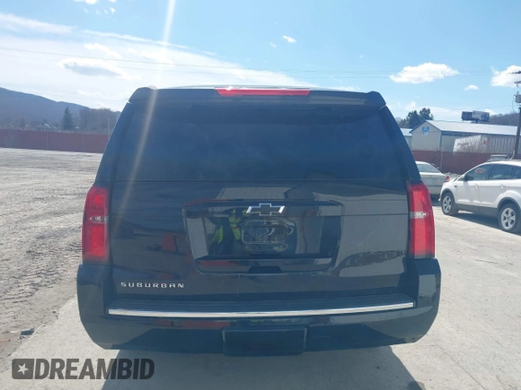 2015 Chevrolet Suburban LTZ with VIN 1GNSKKKC9FR280390, listed as a IAAI auction lot 41882449 with 80,499 mi miles and . Bid and sale history available at DreamBid. Image 16.