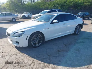 2016 BMW 6 Series 640i xDrive with VIN WBA6D2C51GGT66209, listed as a IAAI auction lot 42064405 with 113,500 mi miles and . Bid and sale history available at carsss.com. Image 2.