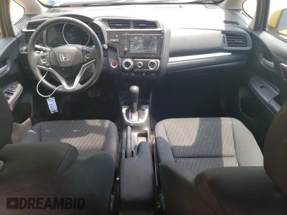 2018 Honda Fit EX с VIN 3HGGK5H89JM717562, выставлен на аукционе Copart как лот 60090475 с пробегом 70 544 миль миль и Списание • Salvage title. История ставок и продаж доступна на DreamBid. Изображение 8.