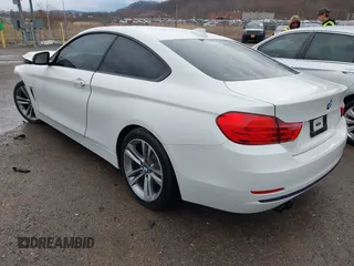 2014 BMW 4 Series 428i with VIN WBA3N3C58EF712202, listed as a IAAI auction lot 41843517 with 90,958 mi miles and . Bid and sale history available at DreamBid. Image 3.