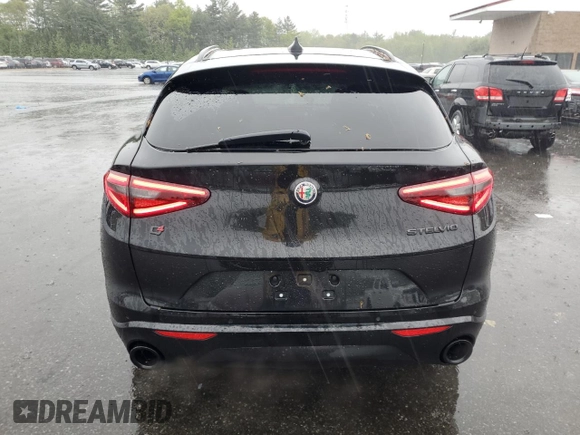 2020 Alfa Romeo Stelvio Ti z VIN ZASPAKBN9L7C94128, wystawiony jako Copart lot #56129775 z przebiegiem 54 042 mil mil oraz Szkody całkowita. Historia ofert i sprzedaży dostępna na DreamBid. Obrazek 6.