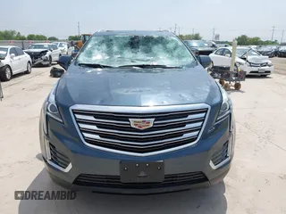 2019 Cadillac XT5 Luxury FWD z VIN 1GYKNCRS1KZ259282, wystawiony jako IAAI lot #41921030 z przebiegiem 27 880 mil mil oraz . Historia ofert i sprzedaży dostępna na DreamBid. Obrazek 12.