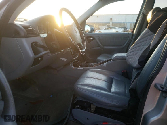 2002 Mercedes-Benz M-Class with VIN 4JGAB54E32A312131, listed as a Copart auction lot 80490084 with 165,365 mi miles and Salvage Title. Bid and sale history available at carsss.com. Image 7.