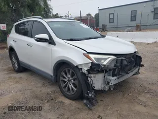 2016 Toyota RAV4 Limited with VIN JTMYFREV2GJ065656, listed as a IAAI auction lot 42575320 with 124,648 mi miles and . Bid and sale history available at DreamBid. Image 1.