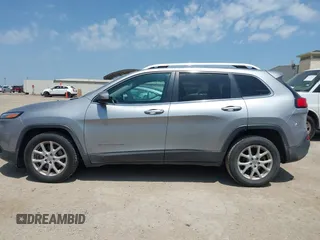 2016 Jeep Cherokee 75th Anniversary with VIN 1C4PJLCB3GW200355, listed as a IAAI auction lot 42140746 with 136,357 mi miles and . Bid and sale history available at DreamBid. Image 14.