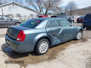 2005 Chrysler 300 with VIN 2C3JA43R45H616682, listed as a IAAI auction lot 41853835 with 158,464 mi miles. Bid and sale history available at carsss.com. Image 4.