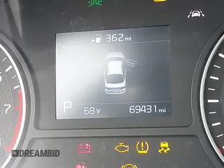 2020 Kia Optima LX z VIN 5XXGT4L39LG448999, wystawiony jako IAAI lot #41620968 z przebiegiem 69 431 mil mil oraz . Historia ofert i sprzedaży dostępna na DreamBid. Obrazek 7.
