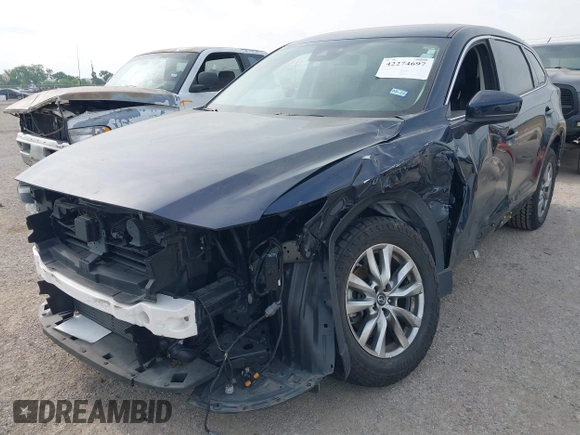 2019 Mazda CX-9 Touring with VIN JM3TCACY7K0334175, listed as a IAAI auction lot 42274697 with 39,751 mi miles and . Bid and sale history available at DreamBid. Image 6.