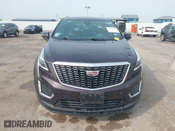 2021 Cadillac XT5 FWD Luxury with VIN 1GYKNAR44MZ184070, listed as a IAAI auction lot 41934265 with 60,596 mi miles and . Bid and sale history available at DreamBid. Image 12.