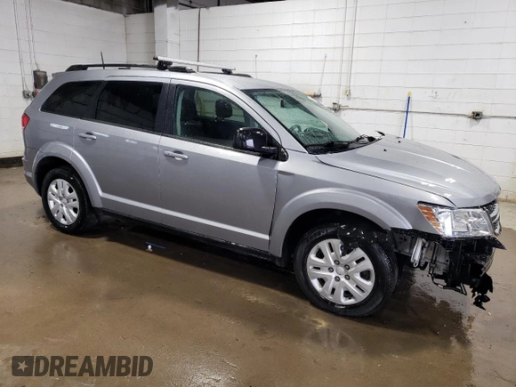 2018 Dodge Journey SE with VIN 3C4PDCAB0JT527478, listed as a Copart auction lot 51521555 with 102,857 mi miles and Salvage Title. Bid and sale history available at carsss.com. Image 4.