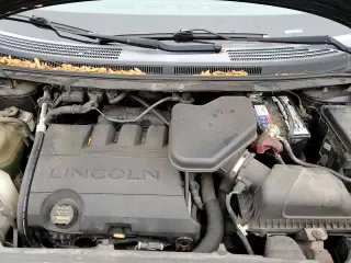 2010 Lincoln MKX with VIN 2LMDJ8JC7ABJ04040, listed as a Copart auction lot 82970504 with 122,294 mi miles and Clean title. Bid and sale history available at DreamBid. Image 14.