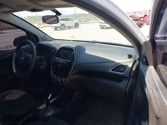 2020 Chevrolet Spark LS with VIN KL8CB6SA9LC427611, listed as a IAAI auction lot 42063543 with 86,676 mi miles. Bid and sale history available at carsss.com. Image 5.