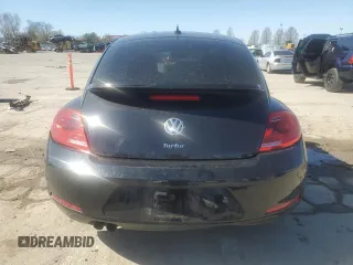 2016 Volkswagen Beetle Wolfsburg Edition with VIN 3VWF17AT4GM638684, listed as a Copart auction lot 49648665 with Not Provided miles and Salvage Title. Bid and sale history available at DreamBid. Image 6.