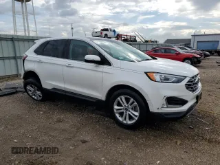 2020 Ford Edge SEL z VIN 2FMPK4J93LBB19642, wystawiony jako Copart lot #56647095 z przebiegiem 29 638 mil mil oraz Szkoda całkowita • Salvage title. Historia ofert i sprzedaży dostępna na DreamBid. Obrazek 4.
