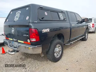 2014 Ram 2500 Tradesman with VIN 3C6TR5CT8EG267161, listed as a IAAI auction lot 41874971 with 264,760 mi miles and . Bid and sale history available at DreamBid. Image 4.