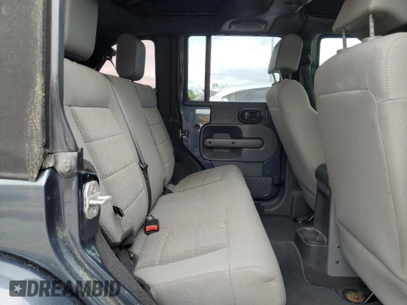 2008 Jeep Wrangler Unlimited Sahara with VIN 1J4GA59108L562831, listed as a Copart auction lot 58949225 with 206,312 mi miles and Clean title. Bid and sale history available at DreamBid. Image 11.