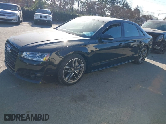 2017 Audi A8 with VIN WAU44AFD0HN017821, listed as a IAAI auction lot 41676097 with 107,378 mi miles and . Bid and sale history available at DreamBid. Image 17.