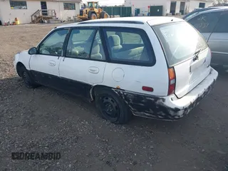 1997 Ford Escort LX with VIN 3FALP15P1VR124828, listed as a IAAI auction lot 42128530 with Not Provided miles and . Bid and sale history available at DreamBid. Image 3.