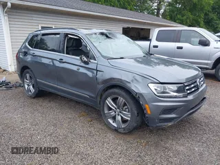 2021 Volkswagen Tiguan SE with VIN 3VV2B7AXXMM070228, listed as a IAAI auction lot 42295644 with 89,576 mi miles and . Bid and sale history available at DreamBid. Image 1.