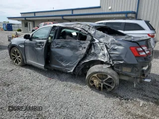 2015 Ford Taurus SEL z VIN 1FAHP2E89FG177287, wystawiony jako Copart lot #56074615 z przebiegiem 196 421 mil mil oraz Szkoda całkowita • Salvage title. Historia ofert i sprzedaży dostępna na DreamBid. Obrazek 2.