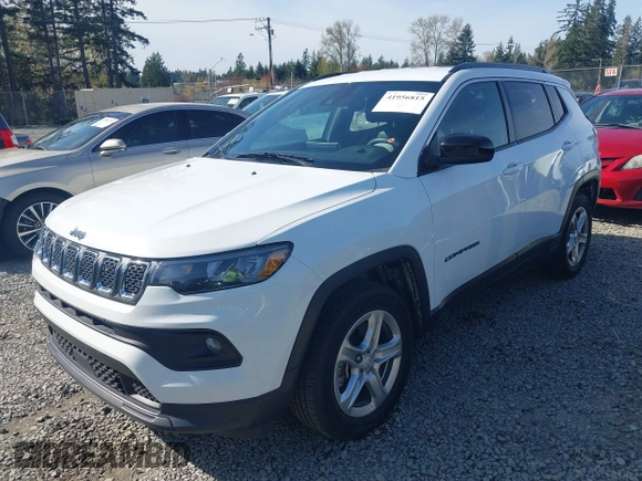 2023 Jeep Compass Latitude with VIN 3C4NJDBN7PT561666, listed as a IAAI auction lot 41956815 with 49,392 mi miles and . Bid and sale history available at DreamBid. Image 2.