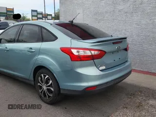 2012 Ford Focus SE with VIN 1FAHP3F22CL279808, listed as a Copart auction lot 62888065 with 138,973 mi miles and Clean title. Bid and sale history available at DreamBid. Image 3.