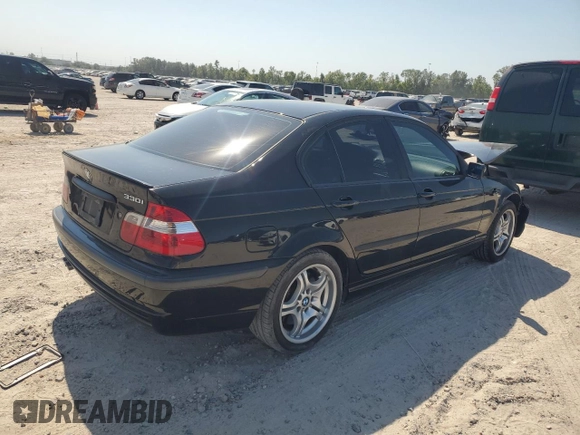 2005 BMW 3 Series 330i with VIN WBAEV53405KM43213, listed as a Copart auction lot 74597414 with 182,881 mi miles and Salvage Title. Bid and sale history available at carsss.com. Image 3.