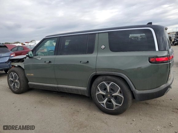 2023 Rivian R1S Launch Edition with VIN 7PDSGABL6PN022754, listed as a Copart auction lot 76849534 with 1,576 mi miles and Salvage Title. Bid and sale history available at carsss.com. Image 2.