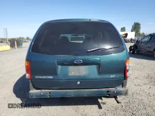 2000 Ford Windstar LX with VIN 2FMZA5149YBC10637, listed as a Copart auction lot 74140104 with 105,704 mi miles and Salvage Title. Bid and sale history available at carsss.com. Image 6.