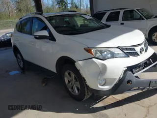 2014 Toyota RAV4 XLE with VIN JTMRFREV6EJ002755, listed as a IAAI auction lot 42021556 with 133,570 mi miles. Bid and sale history available at carsss.com. Image 1.