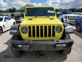 2022 Jeep Wrangler Unlimited Rubicon with VIN 1C4HJXFG3NW214174, listed as a Copart auction lot 74136484 with 5,292 mi miles and Salvage title. Bid and sale history available at DreamBid. Image 5.