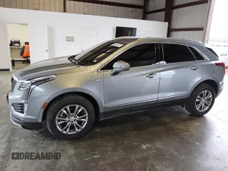 2023 Cadillac XT5 AWD Premium Luxury with VIN 1GYKNDR49PZ222592, listed as a Copart auction lot 79759624 with 32,177 mi miles and Clean Title. Bid and sale history available at DreamBid. Image 1.