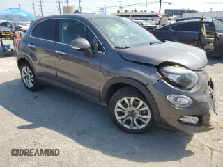 2017 FIAT 500X Lounge with VIN ZFBCFXDB7HP518161, listed as a Copart auction lot 60134985 with 51,357 mi miles and Salvage title. Bid and sale history available at DreamBid. Image 4.