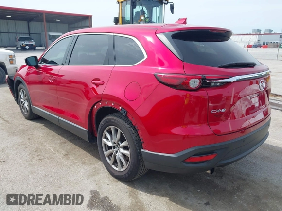 2016 Mazda CX-9 Touring with VIN JM3TCACY4G0112961, listed as a IAAI auction lot 42094718 with 114,679 mi miles and . Bid and sale history available at DreamBid. Image 3.