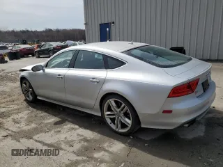 2015 Audi S7 with VIN WAUW2AFC8FN023143, listed as a Copart auction lot 49879934 with 67,651 mi miles. Bid and sale history available at carsss.com. Image 2.