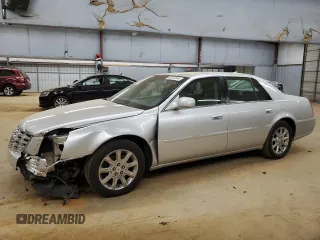 2009 Cadillac DTS 1SA z VIN 1G6KD57Y59U128832, wystawiony jako Copart lot #86241654 z przebiegiem 169 701 mil mil oraz Szkoda całkowita • Salvage title. Historia ofert i sprzedaży dostępna na DreamBid. Obrazek 1.
